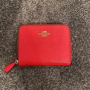 NWOT coach zip around wallet in RED
